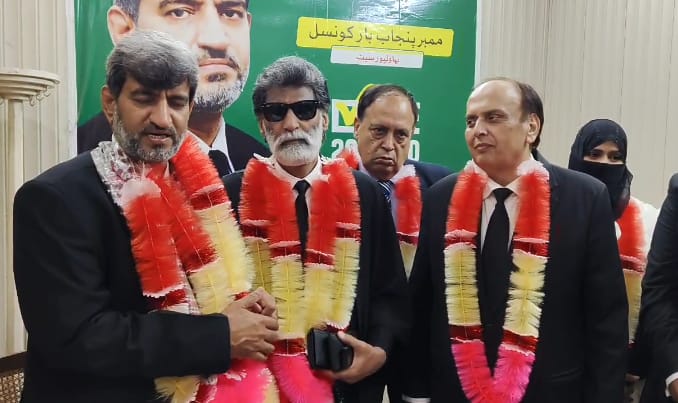Malik Muzzafar Karim advocate greets Ch Umar Mehmood on his electoral victory in Punjab bar Council Elections